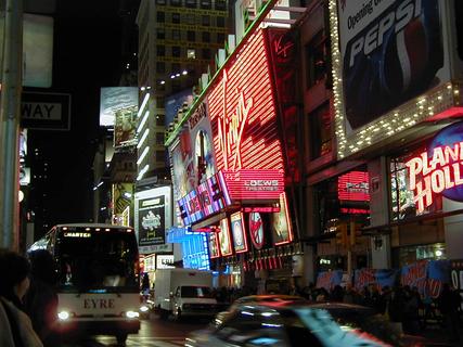 Times Square at night<br>Location: <a href="https://www.google.com/maps/search/?api=1&query=40.75791,-73.98559" target="_new">Times Square</a>